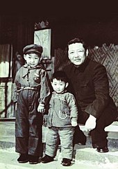 Five-year-old Xi Jinping (left) with younger brother Xi Yuanping and father Xi Zhongxun in 1958