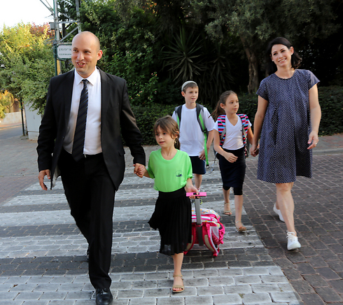 Naftali Bennett with his children