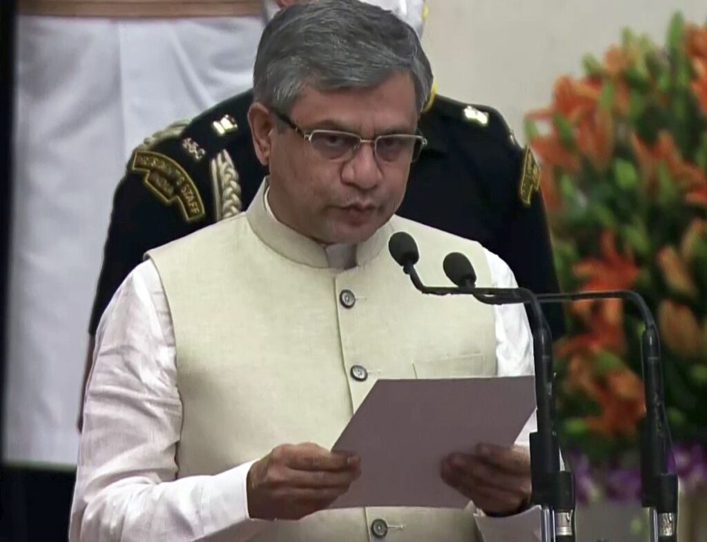 Ashwini Vasihnaw takes the oath as minister during the swearing-in ceremony