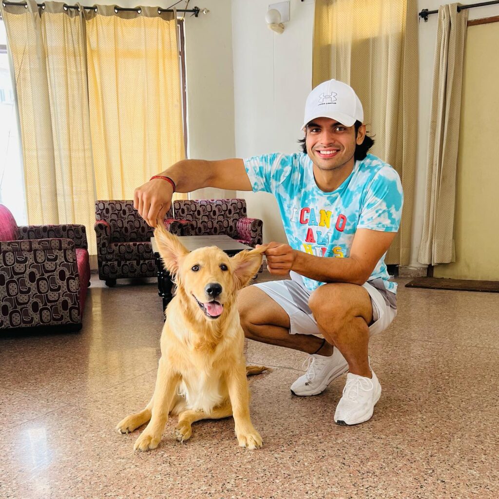 Neeraj Chopra with his pet dog Tokyo