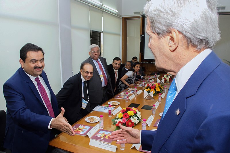 Secretary Kerry greets Executive Chairman Adani before meeting with Indian CEOs