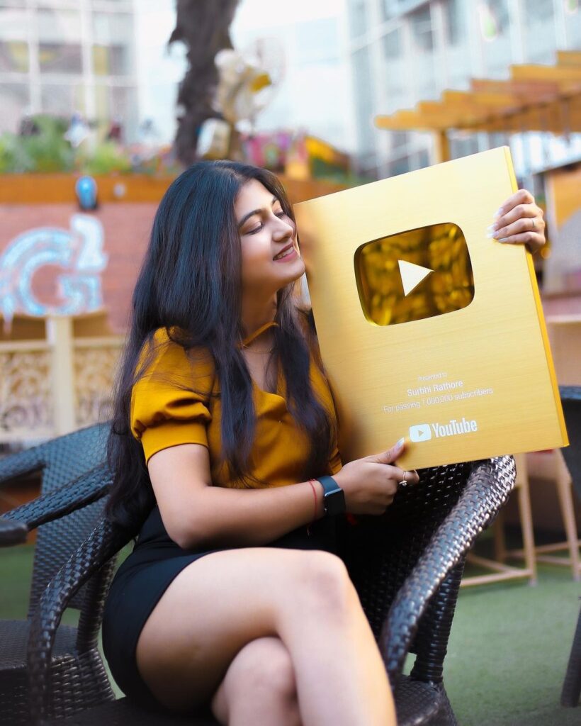 Surbhi with his golden youtube play button