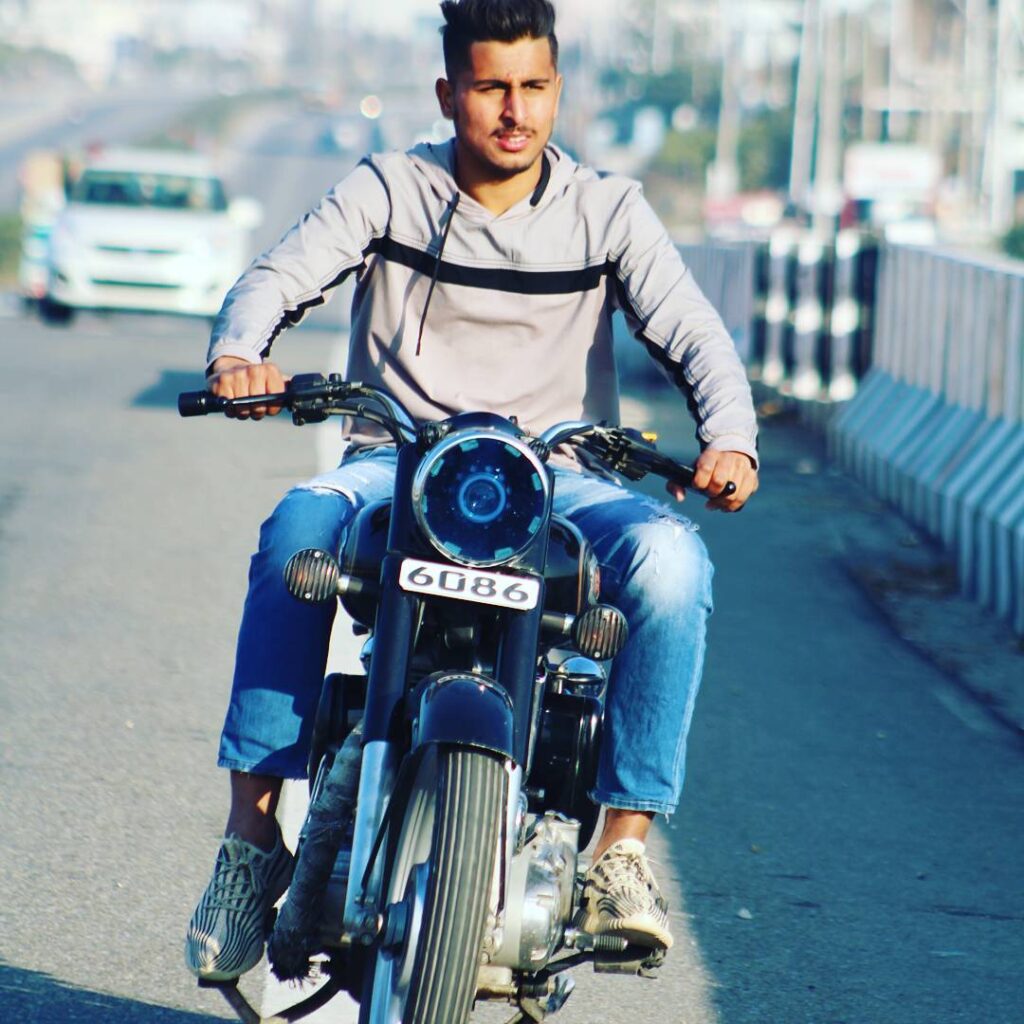 Umran Malik rides on his Bullet bike