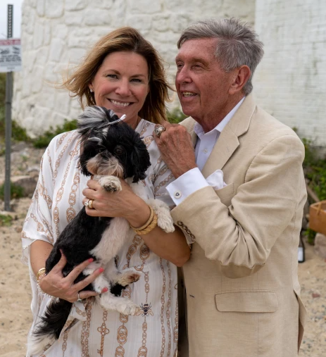 George and his wife with his pet dog