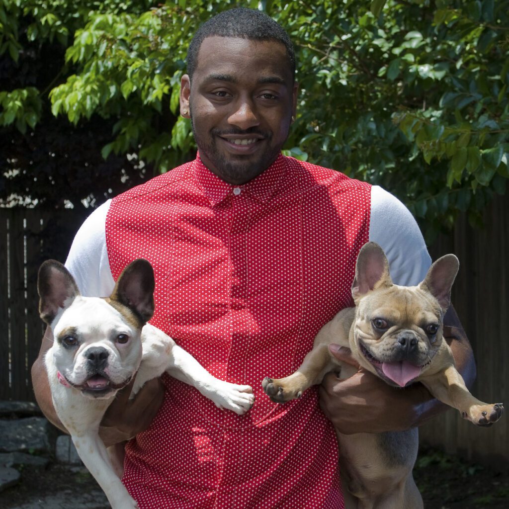 John Wall with his pet dogs