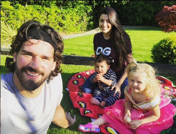 Alisson Becker with his wife and children