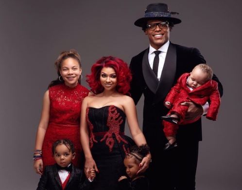 Cam Newton with his wife and children