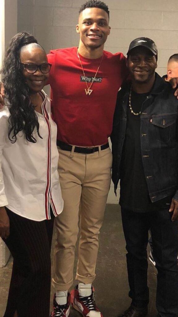 Russell with his parents