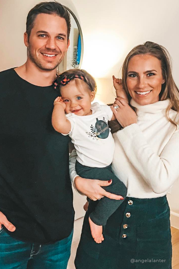 Angela with her husband and daughter