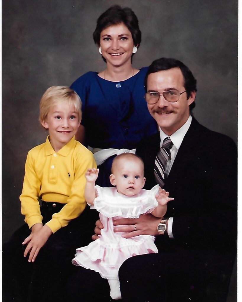 Kelsey McEwen old photo with her parents and elder brother