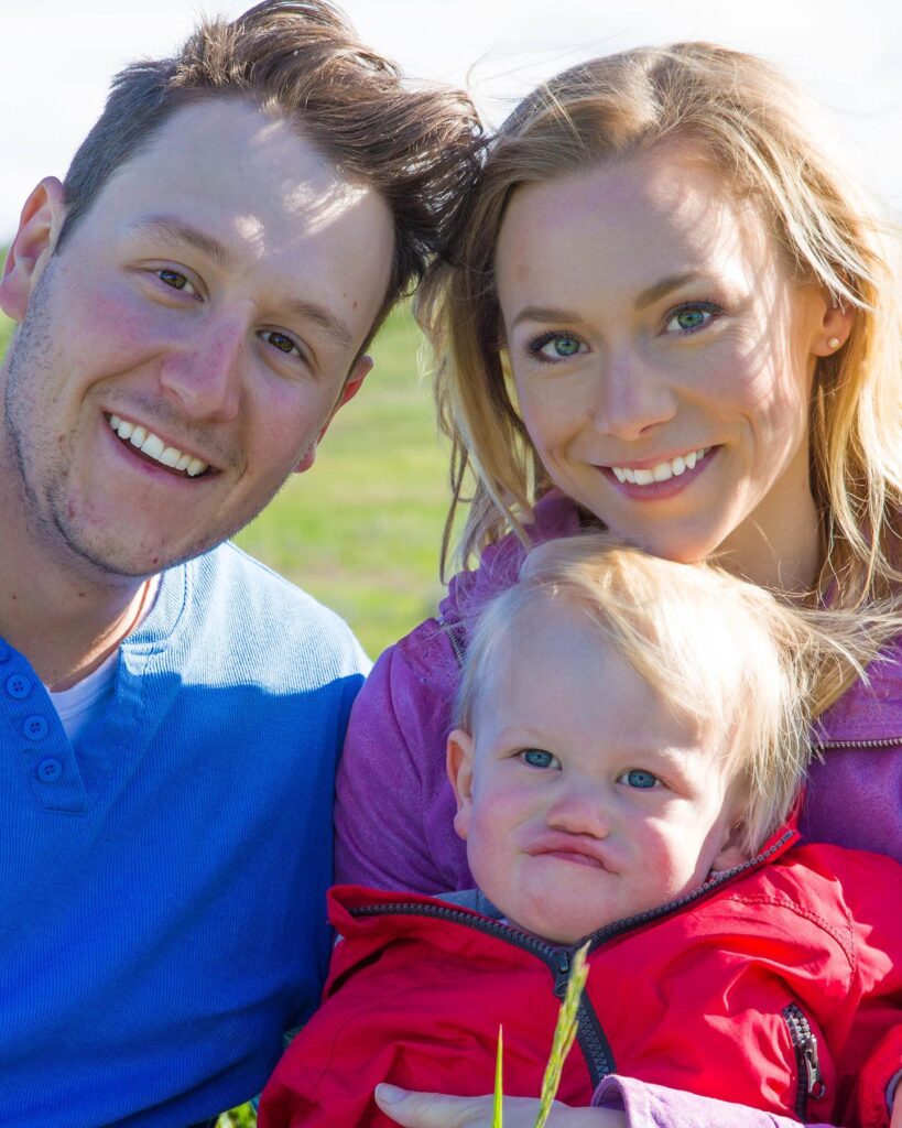 Kelsey McEwen with her husband and kid