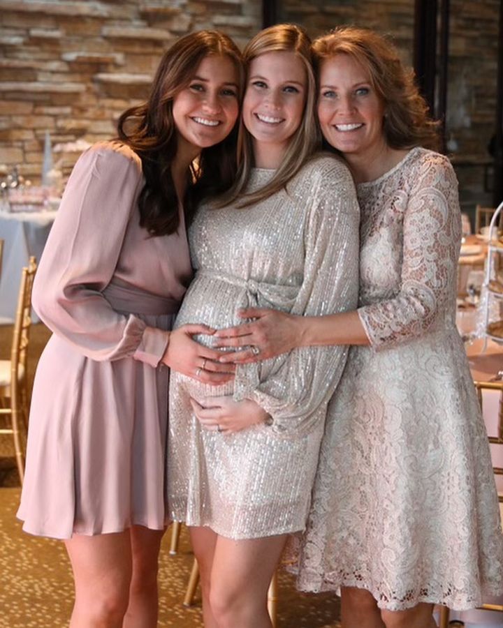 Christina Allegretti with her mother and sister