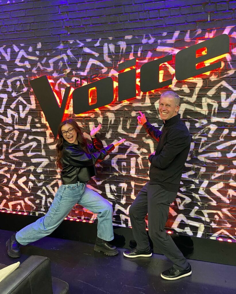 Anna Cathcart with her father in The Voice show