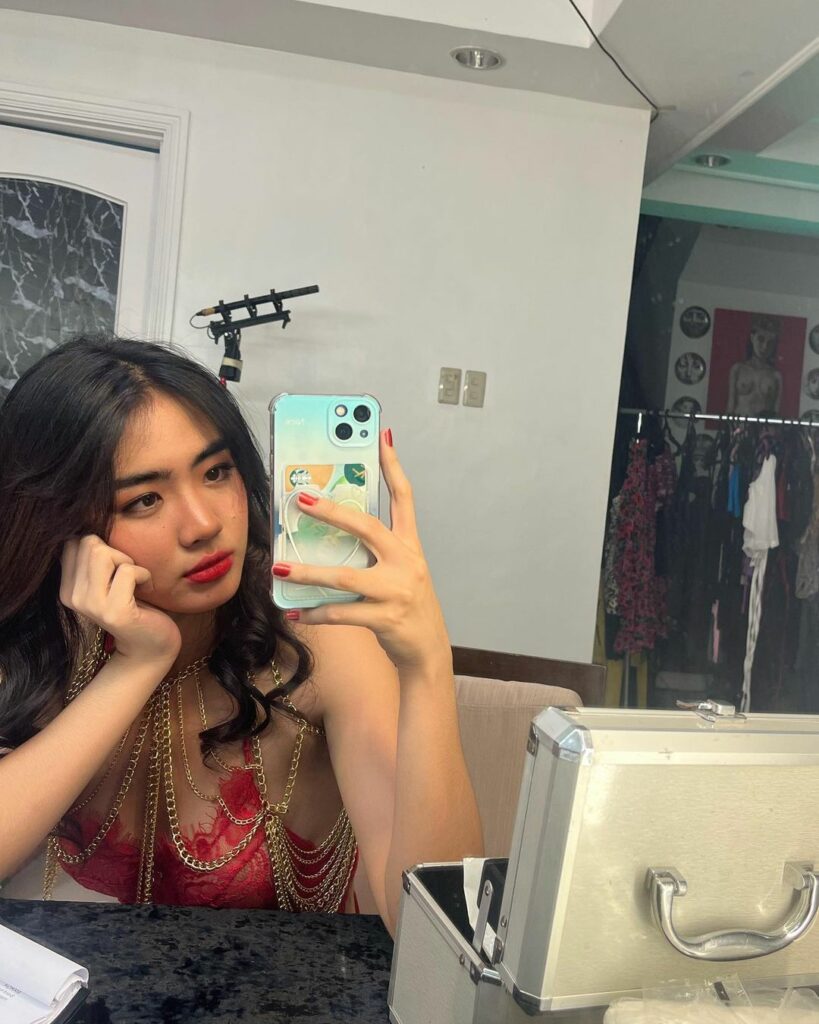 Azi Acosta mirror selfie
