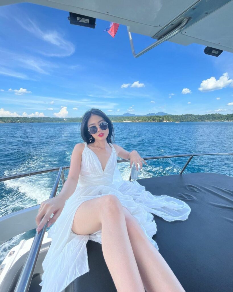Azi Acosta on a yacht