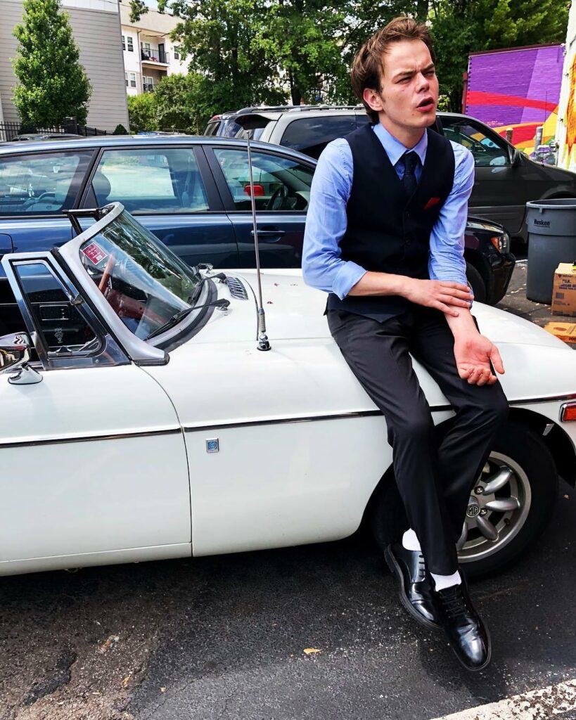 Charlie Heaton with his luxury car