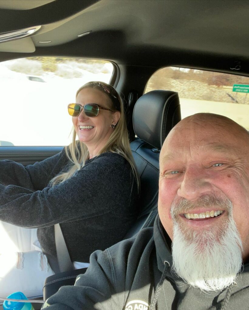 David Woolley with Christine on a car trip