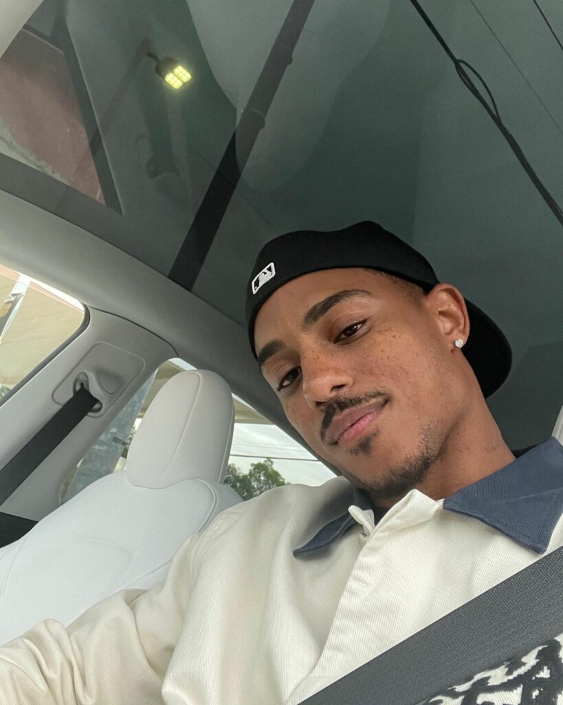 Keith Powers in her car