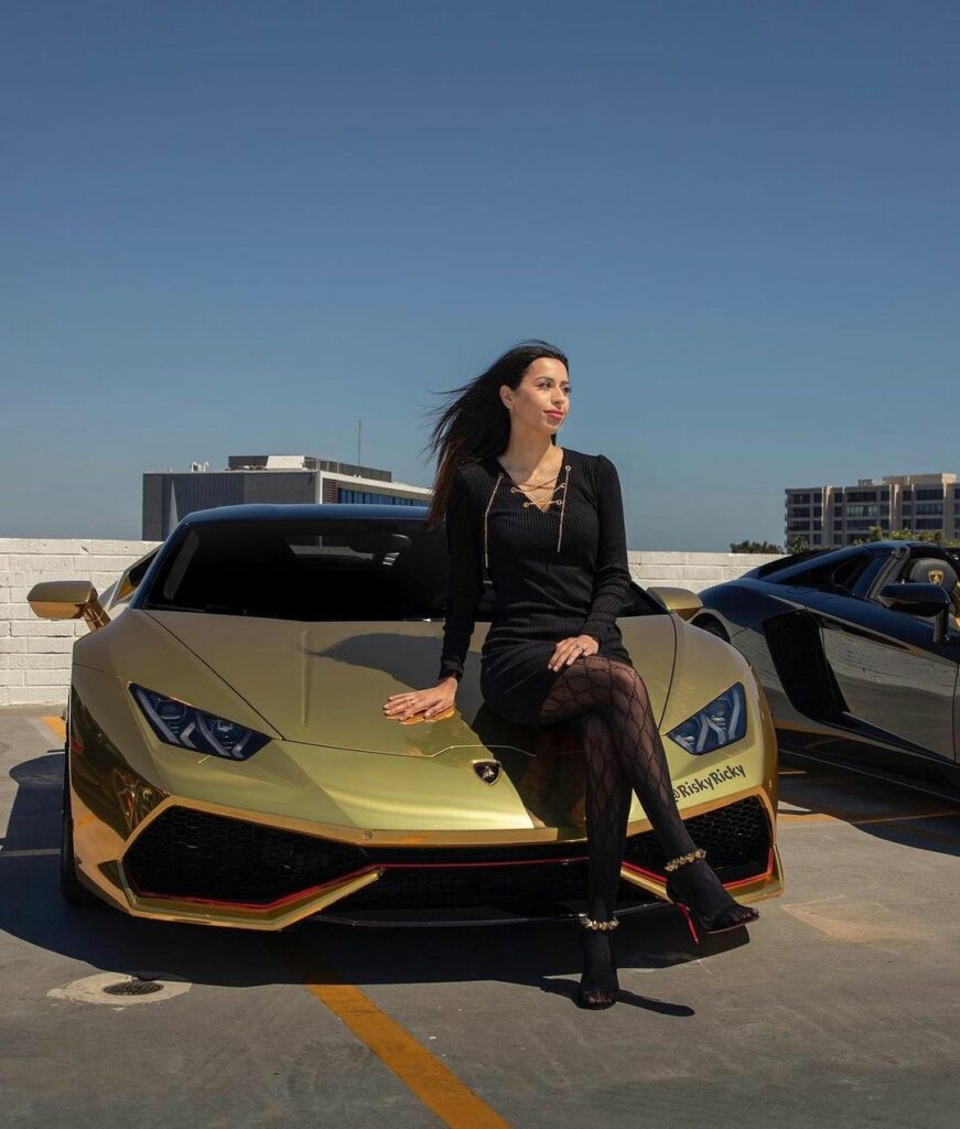 Linda Andrade with her Lamborghini car