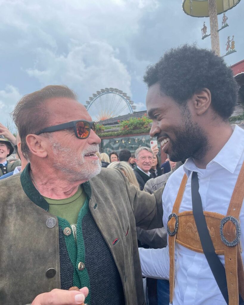 Milan Carter with Arnold Schwarzenegger