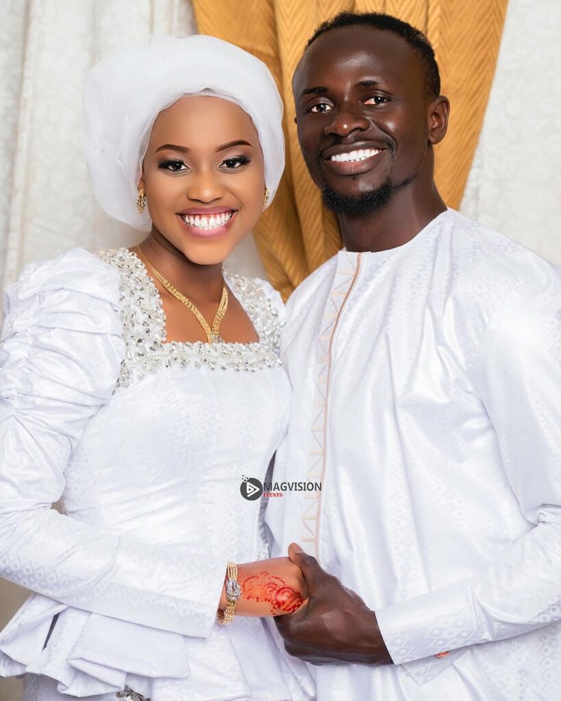 Aisha Tamba with her husband in marriage photo