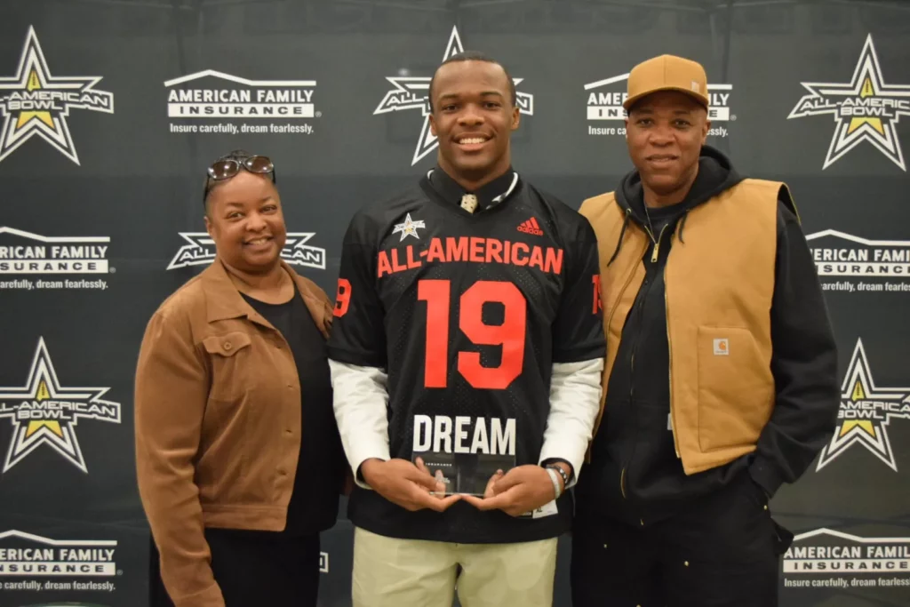 Isaiah Foskey with his parents