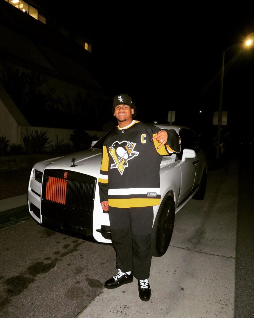 Kingsley Suamataia with his luxury car