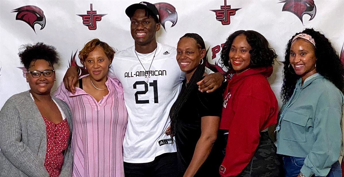 Marvin Harrison Jr. with his family members