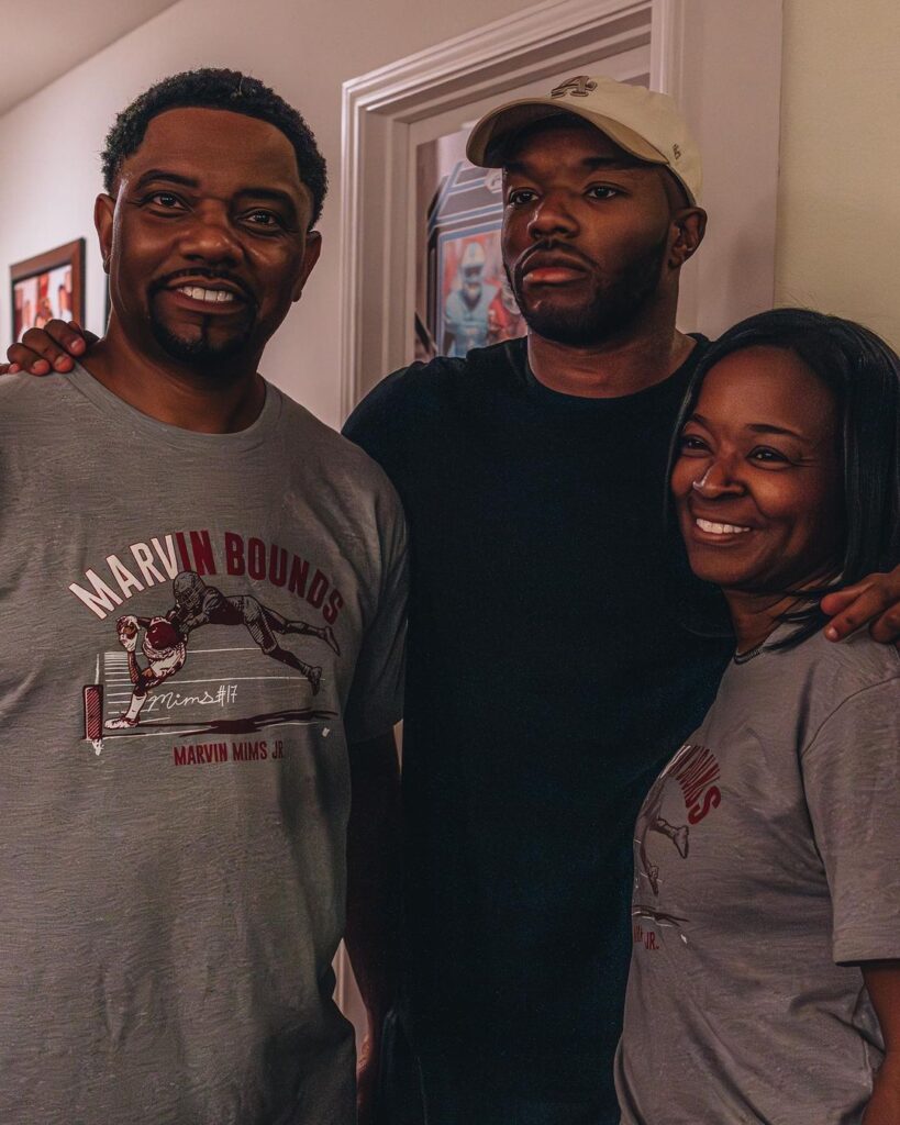 Marvin Mims with his parents