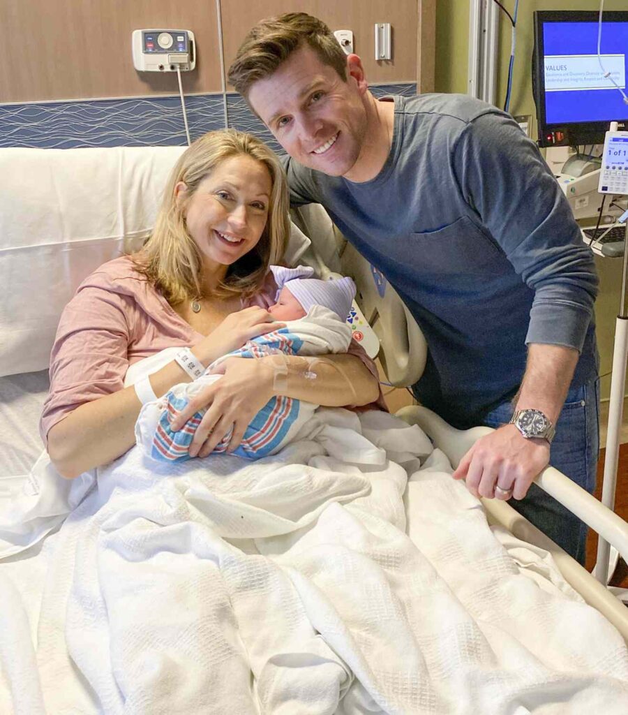 Phil Mattingly with his wife and child
