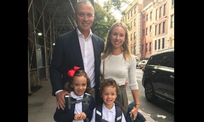 Emily Threlkeld with her husband and children
